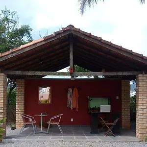 Quarto em Acomodações Particulares Vila Verde Suites